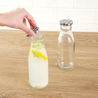 Restaurantware French Countryside 15 Ounce Glass Bottles 10 Durable Juice Bottles - With Black Plaid Lid Dishwashable Clear Glass Countryside Bottles For Hot And Cold Beverages